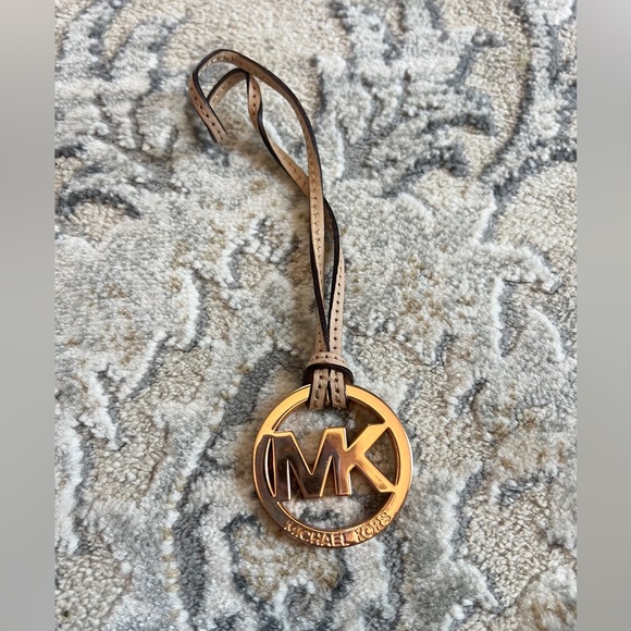 Michael Kors Handbags - Michael Kors Rose Gold Logo Circle Charm with Taupe Strap